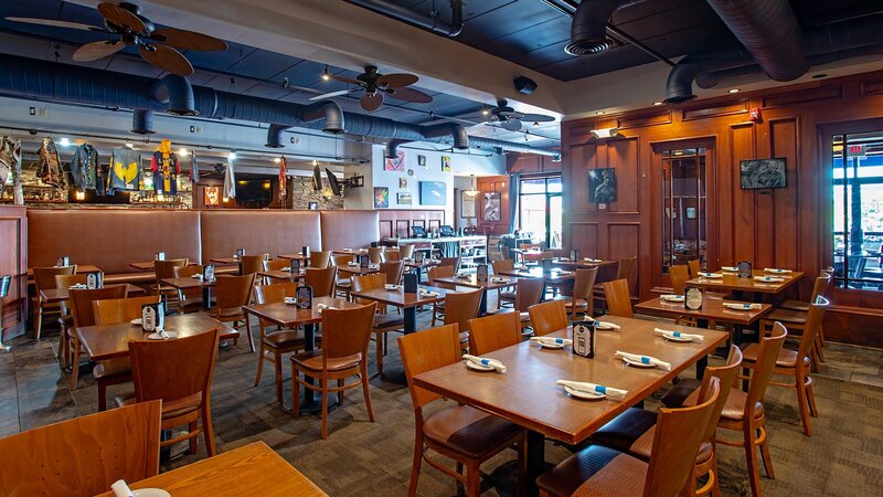 Many set tables in the main dining room