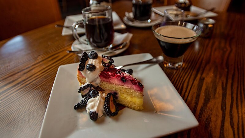 Berry cake with coffee drinks