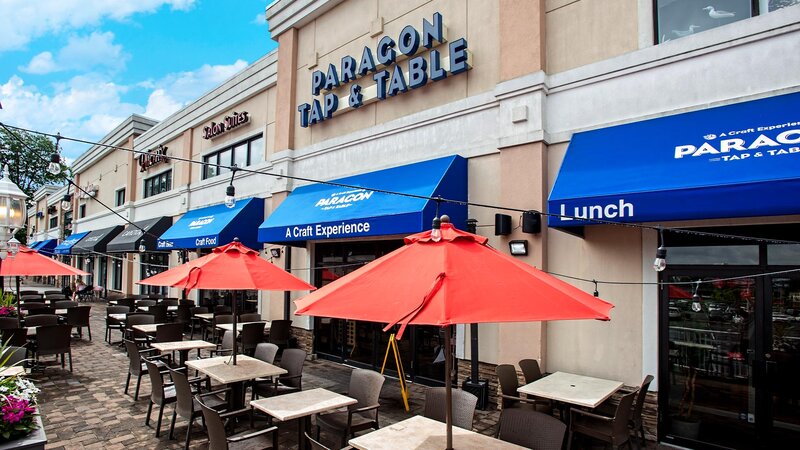 Outdoor seating with view of entrance of the restaurant